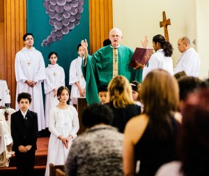 Priest leading the Collect Prayer